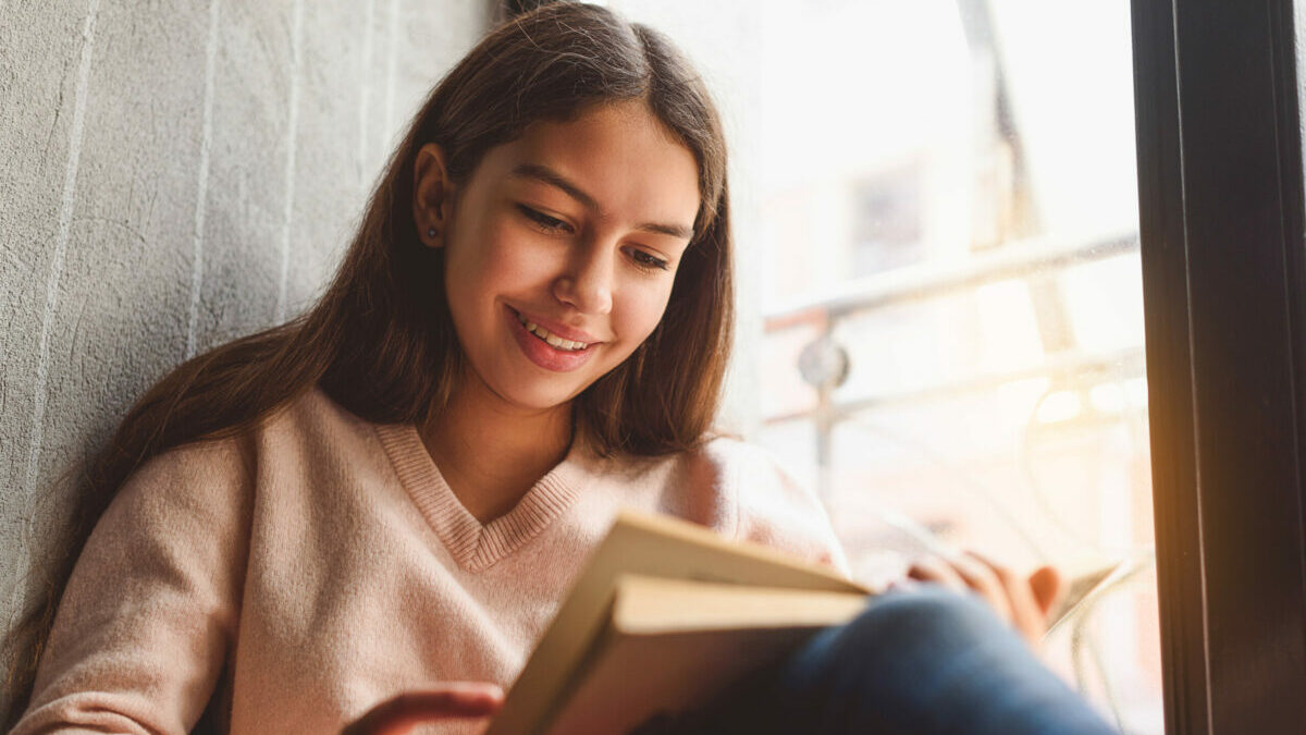 Teen-girl-reading-scaled-e1649145731724.jpg