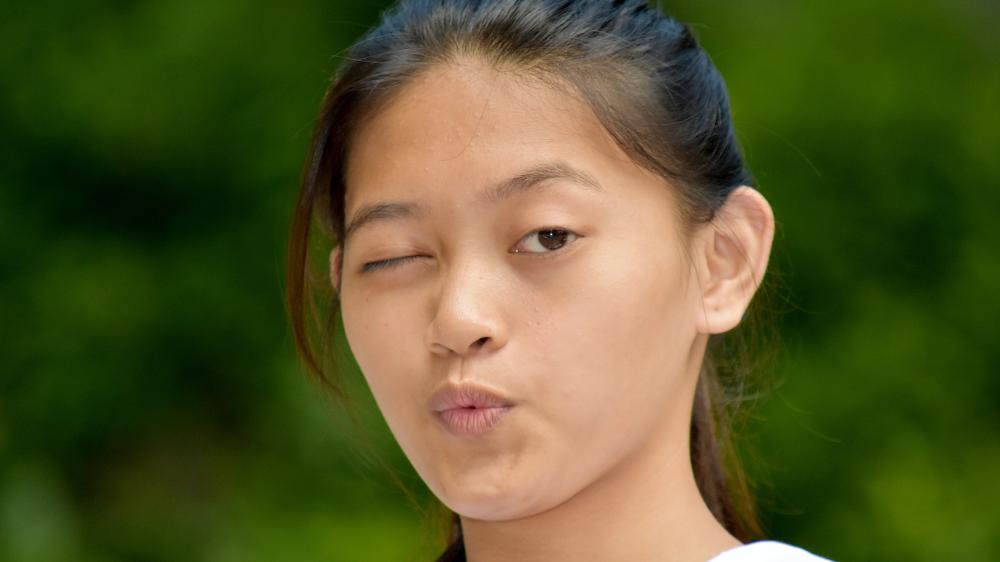 Asian girl winking.jpg