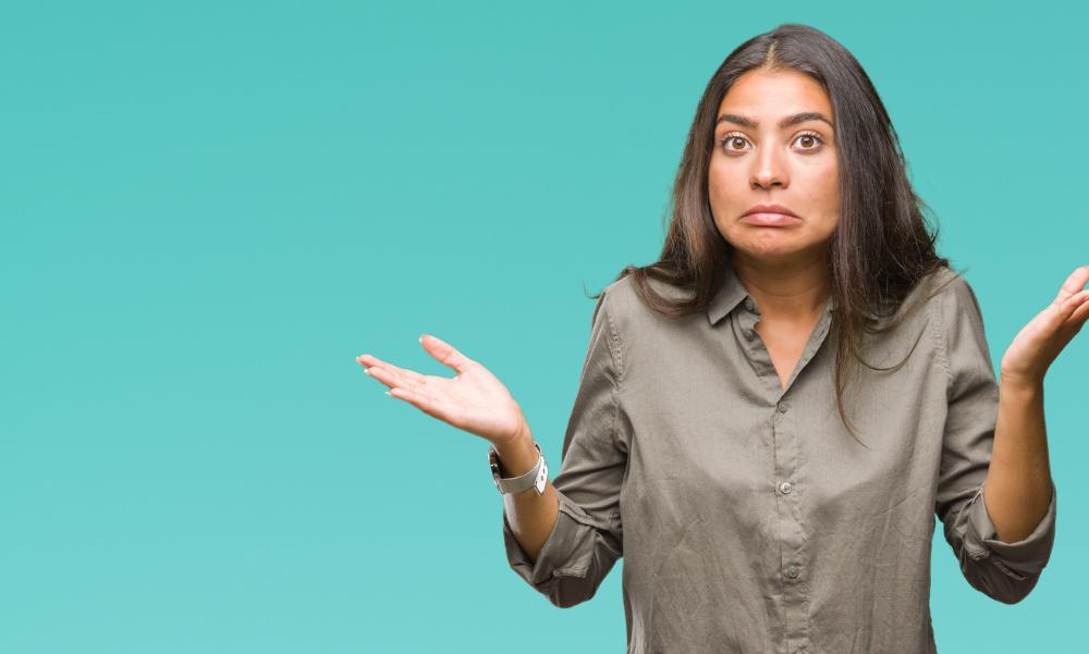 woman confused hands up.jpg
