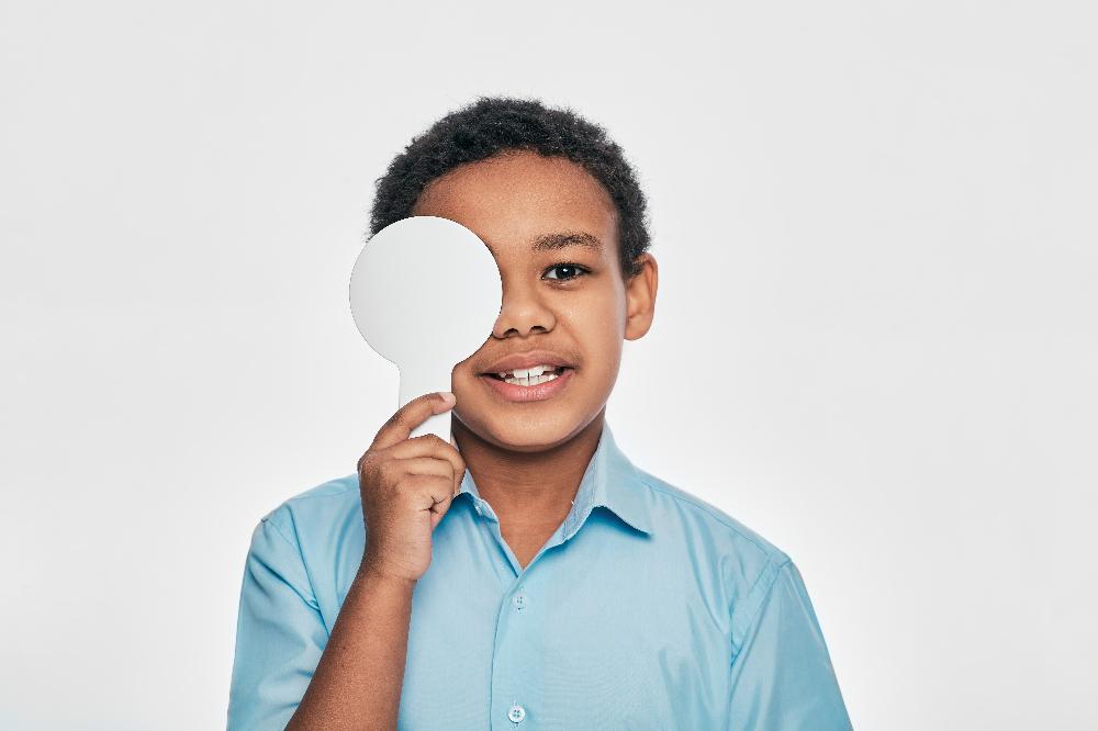 Boy african american eye exam_What happens to binocular vision during cycloplegia.jpg