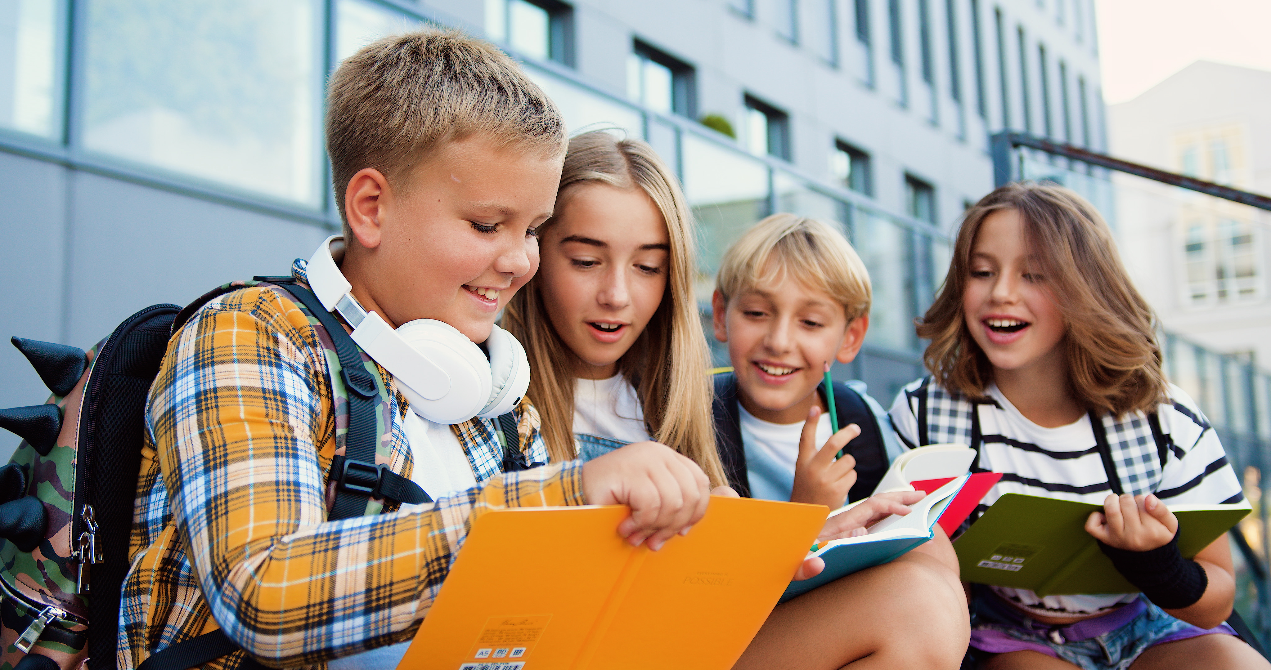 young teens reading outside.jpg