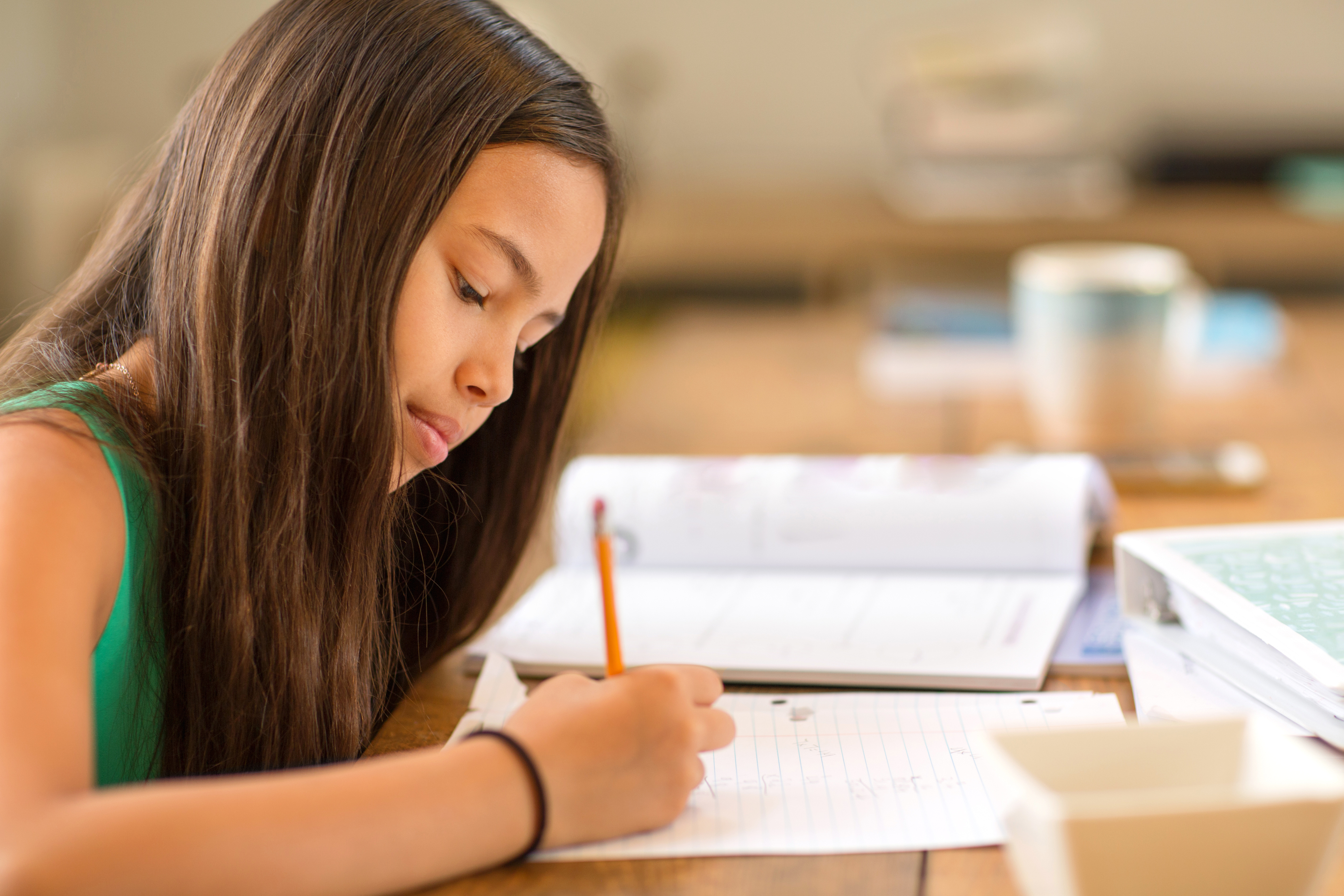 Girl studying_Why MiSight 1 day is not a multifocal contact lens.jpg