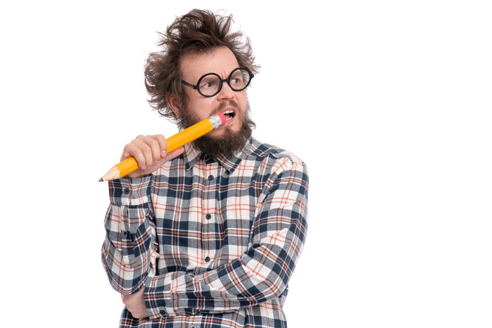 guy chewing on large pencil_Managing a myopic anisometropic amblyopic child.jpg