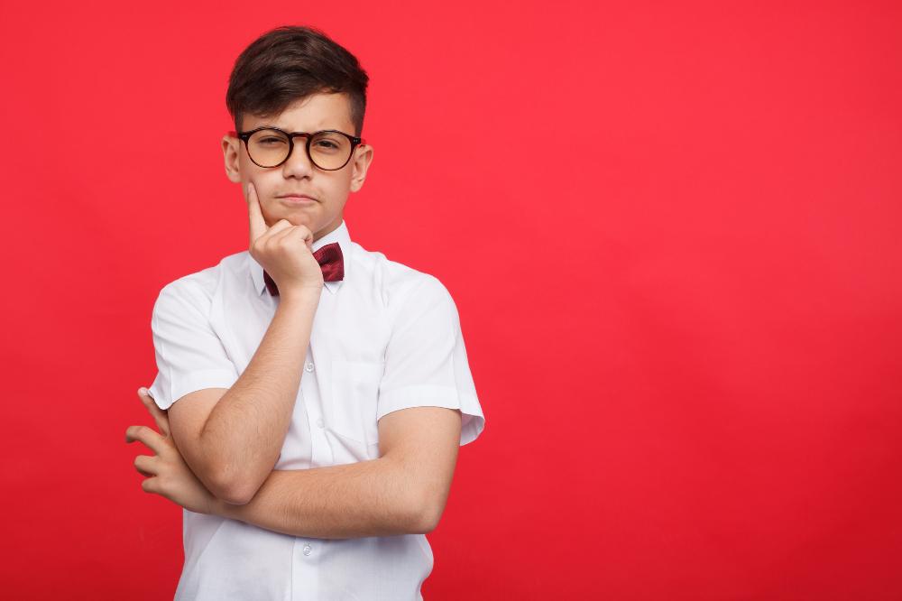 Boy thinking_managing the non-myopic eye in unilateral myopia.jpg