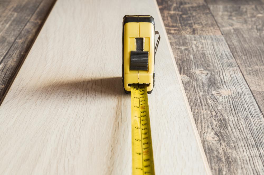 Tape measure on wooden board.jpg