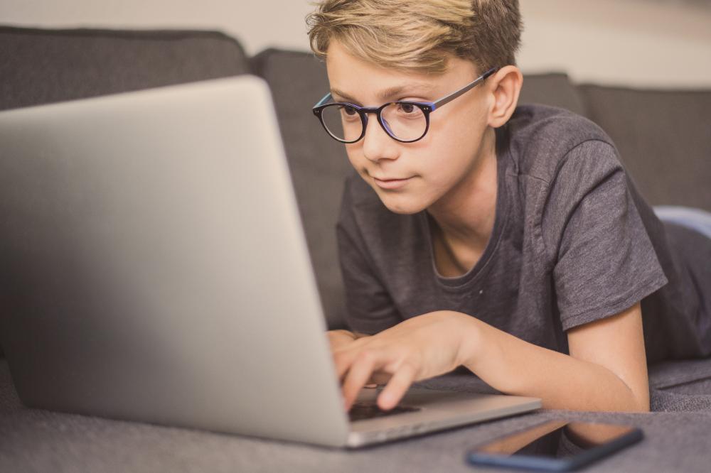 Spanish boy on laptop.jpg