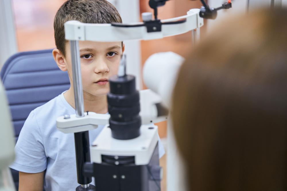 Boy slit lamp_Clinical Leader Case Study_From pre-myopia through to myopia control with contact lenses.jpg